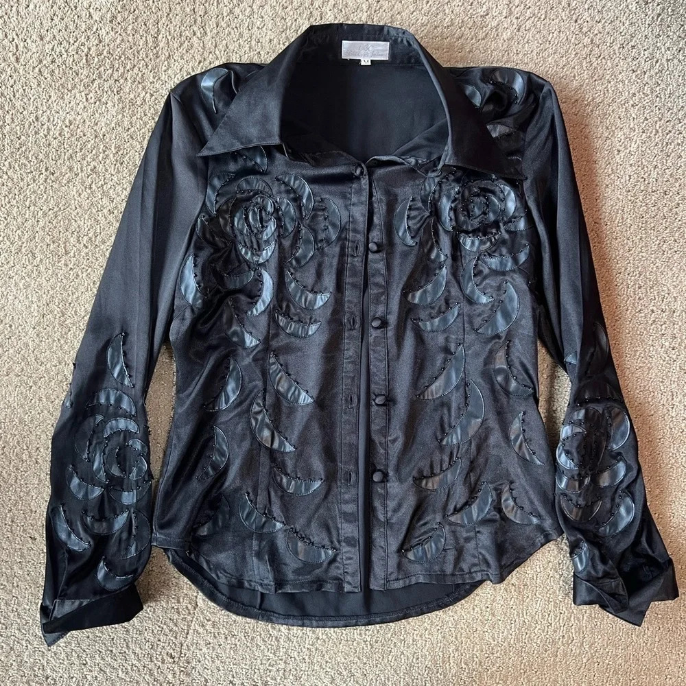 Beautiful black blouse with flower and button detail